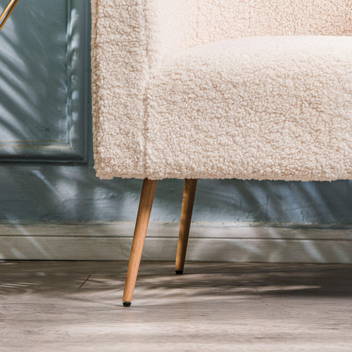 Fauteuil de salon en métal et bouclettes blanches